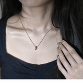 Elegant Gold Droplet Pendant