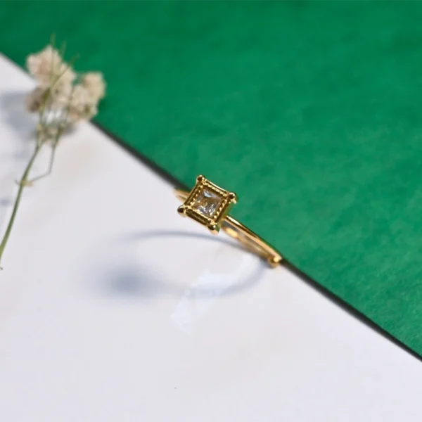 Elegant Gold-Tone Adjustable Ring with Square Crystal